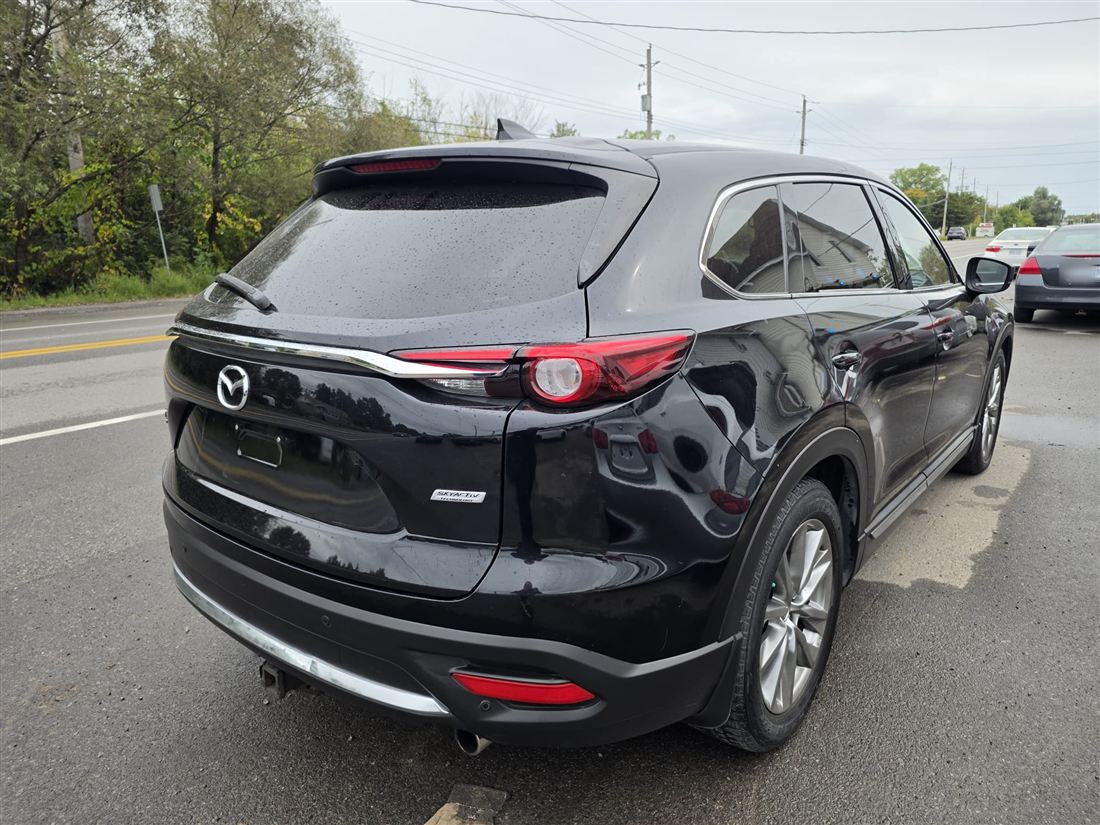 Black Mazda CX-9 with glossy paint