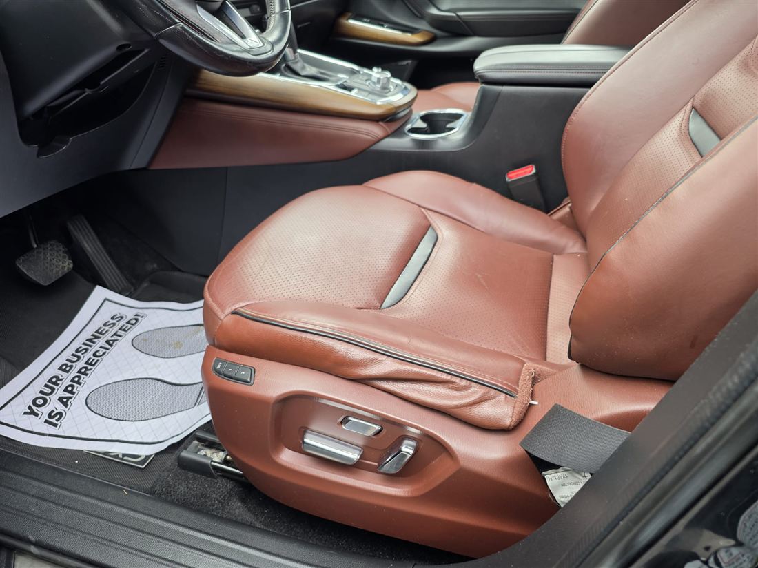 Brown leather driver seat after cleaning