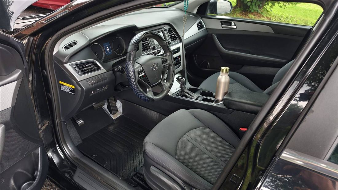 Clean cloth front seats and dashboard