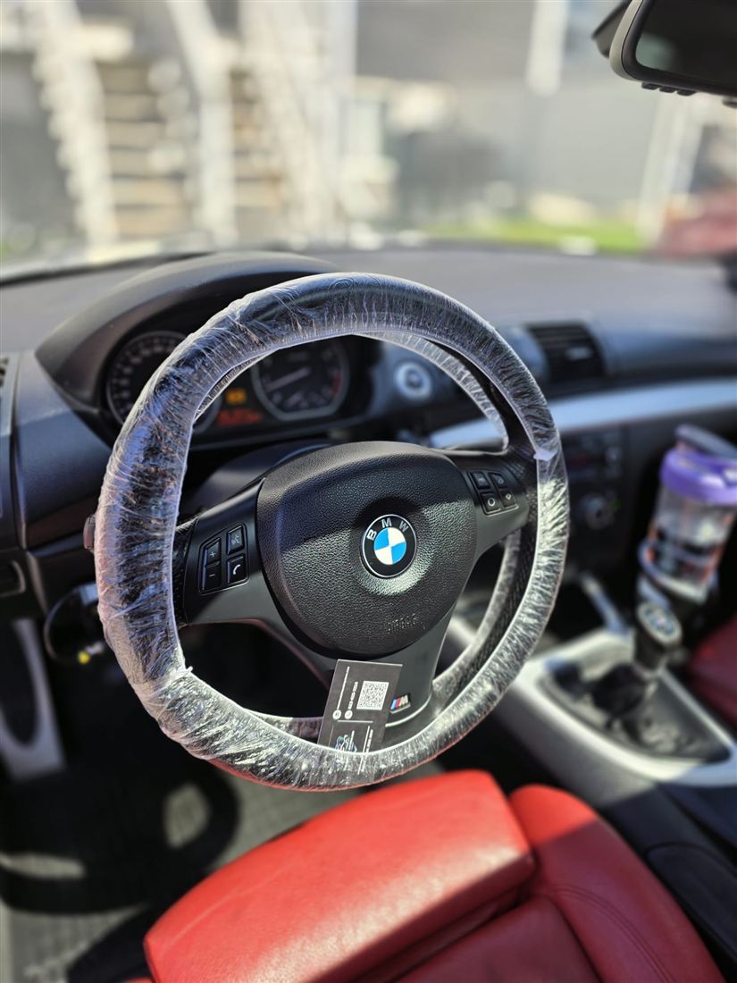 BMW steering wheel wrapped after detailing