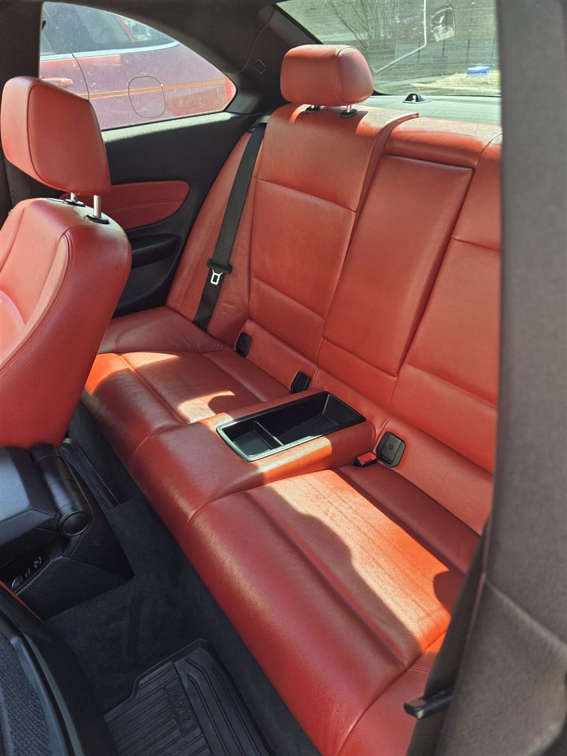 BMW rear seats with clean red leather